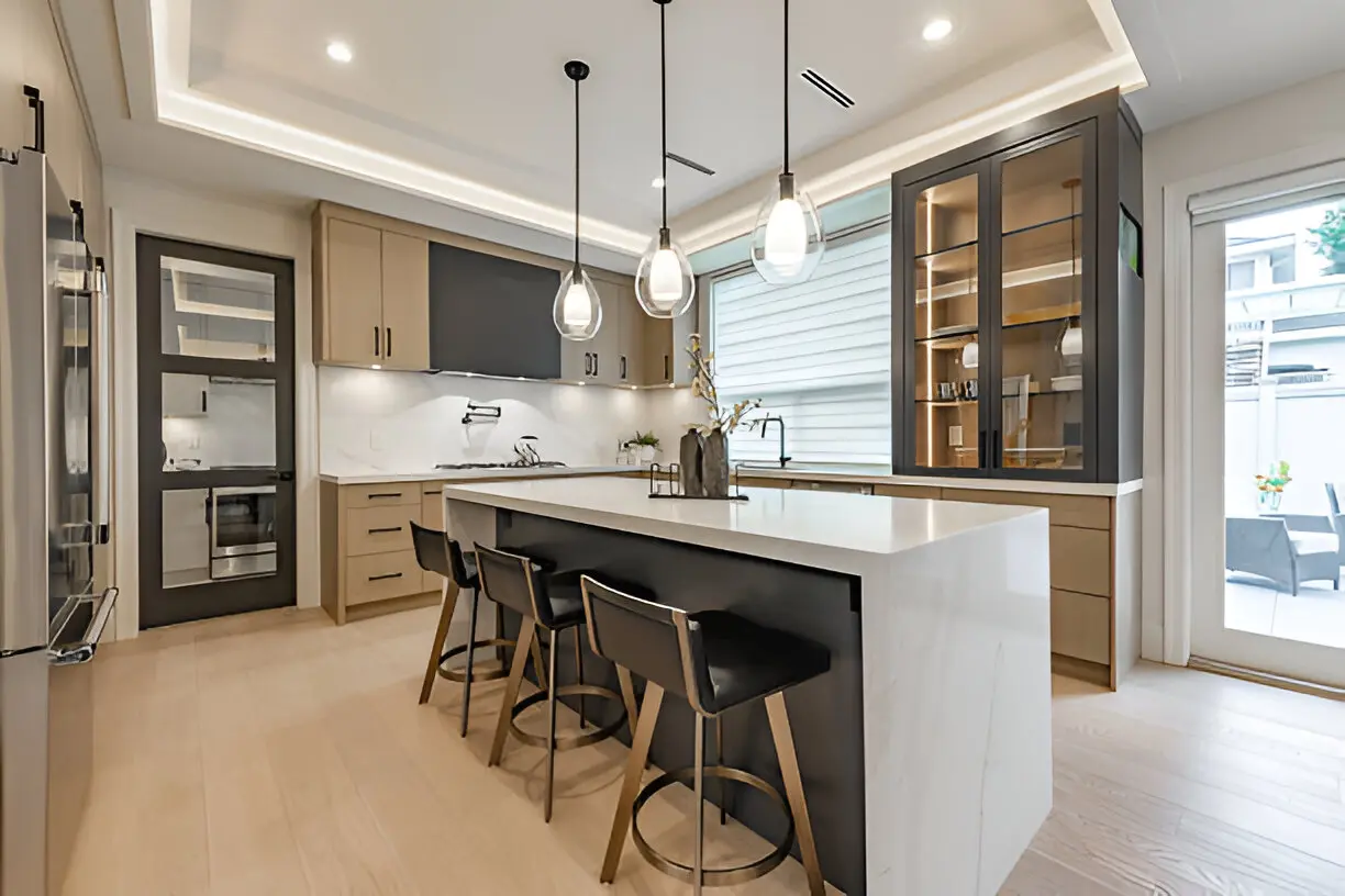 Contemporary Kitchen Remodeling project with recessed lighting and modern fixtures.