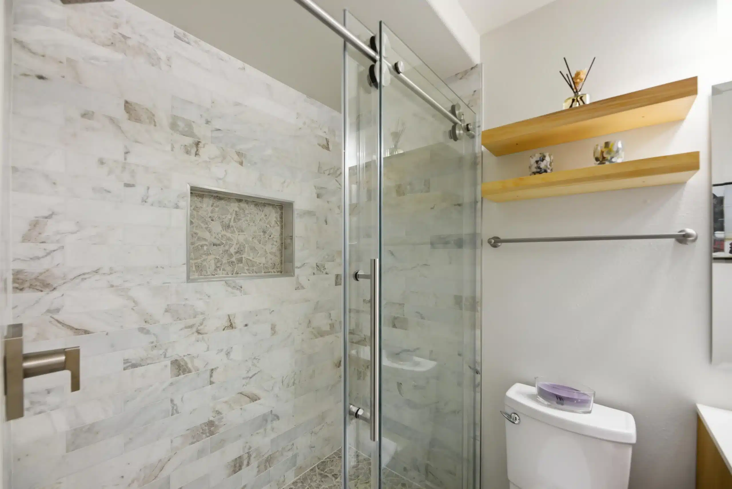 Bathroom Remodeling in North Bend featuring a modern vanity, walk-in shower, and contemporary finishes