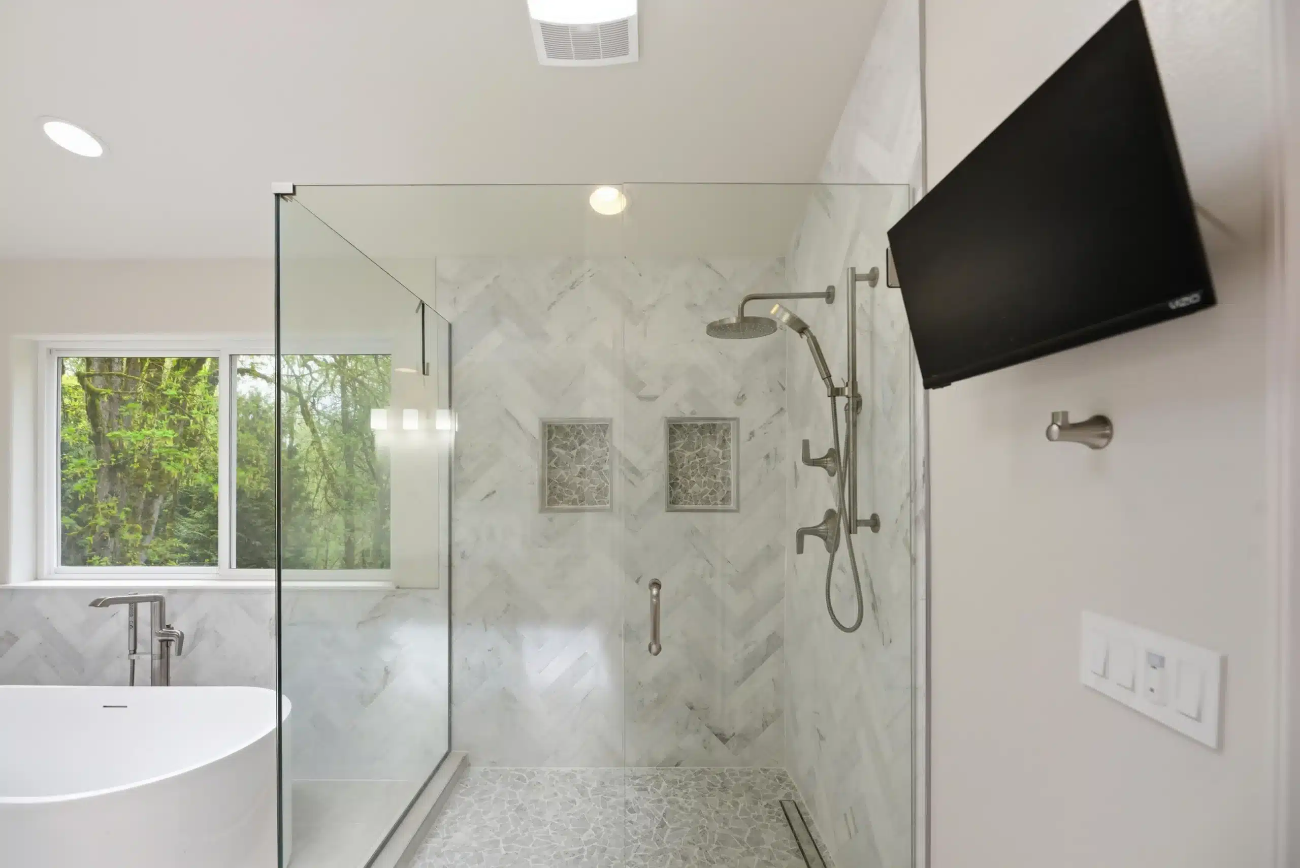 Shower Remodeling showcasing durable wall surfaces, quality fixtures, and stylish long-lasting finishes