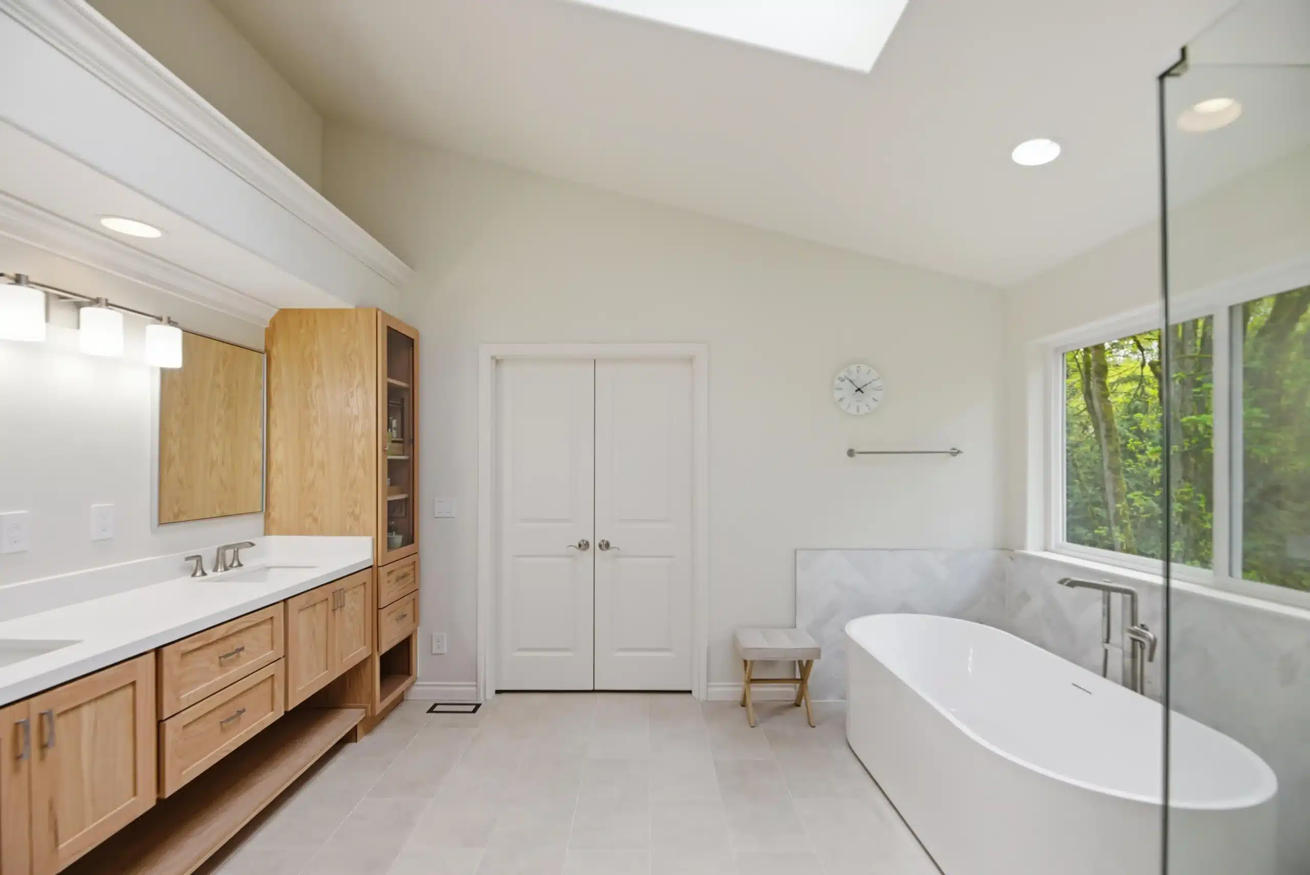 Bathroom Remodeling in Talus featuring a custom primary bathroom with modern vanity, walk-in shower, and elegant finishes